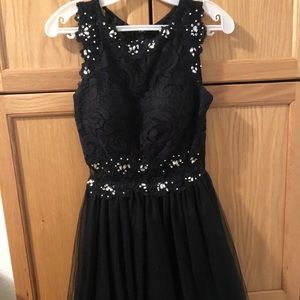 Black tulle homecoming dress with beading and lace